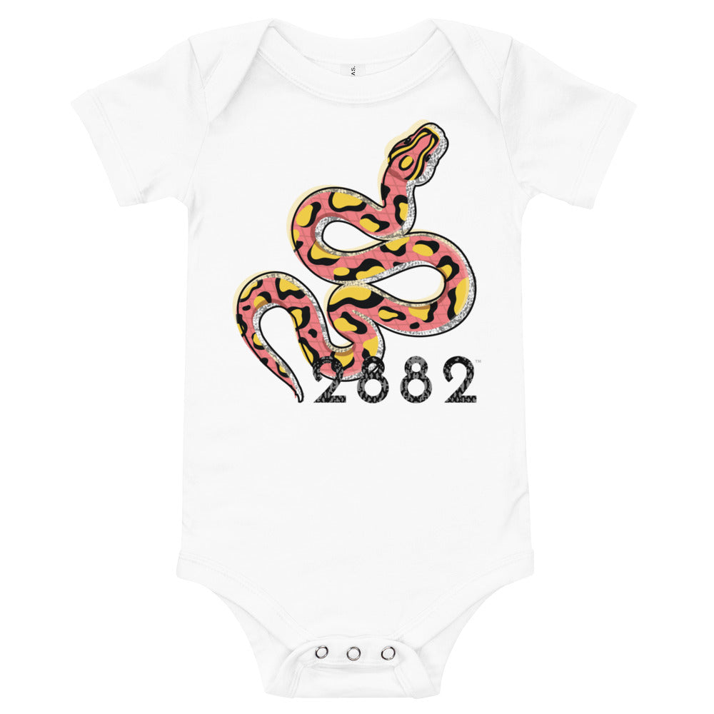 A stylish 2882Junior™ Eco Snake One Piece made of 100% cotton, featuring a star-shaped print and three-snap leg closure for easy changing.